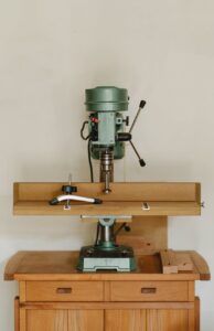 drilling machine on wooden table