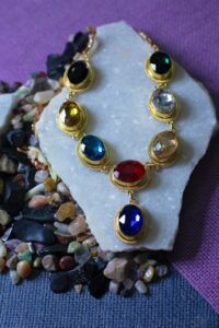 necklace on white rock