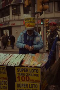 men selling lottery coupons