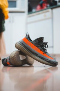 pair of stylish mens sneakers on floor