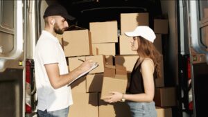 man and woman checking the packages