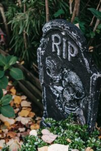 fake gravestone placed as decoration for halloween celebration