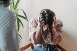 anonymous woman having dispute with crop person