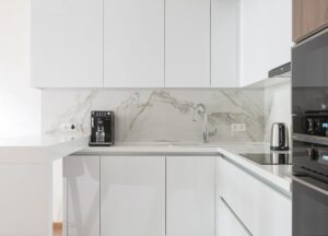 modern kitchen interior with furniture and appliances