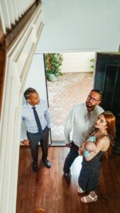 people looking at a house
