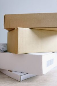 stack of carton boxes on table