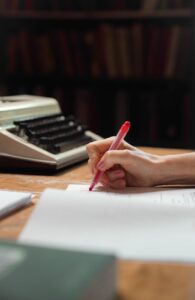 a person checking a composition