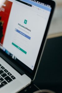 laptop displaying pexels website