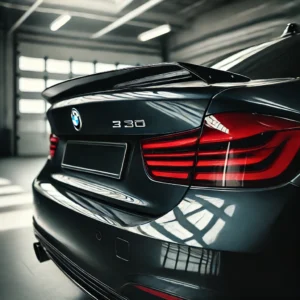 DALL·E 2025 01 25 05.31.15 A sleek black trunk lip spoiler installed on a BMW 3 Series F30. The spoiler is glossy and aerodynamic enhancing the cars sporty appearance. The bac 1